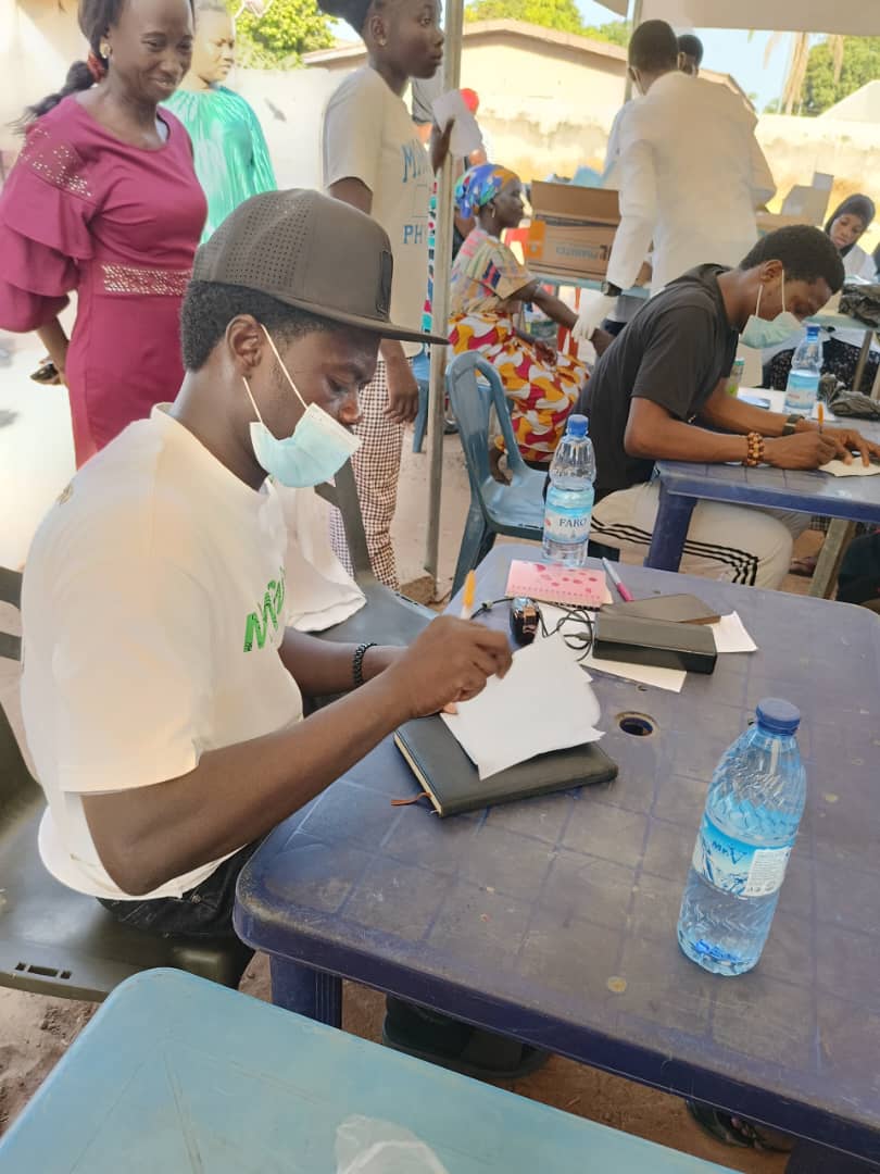 Doctors attending to patients at the jpn health outreach